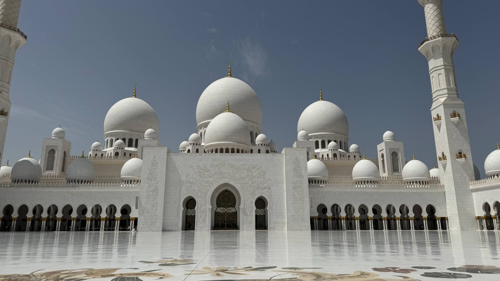 Grand white domed architecture under a clear sky