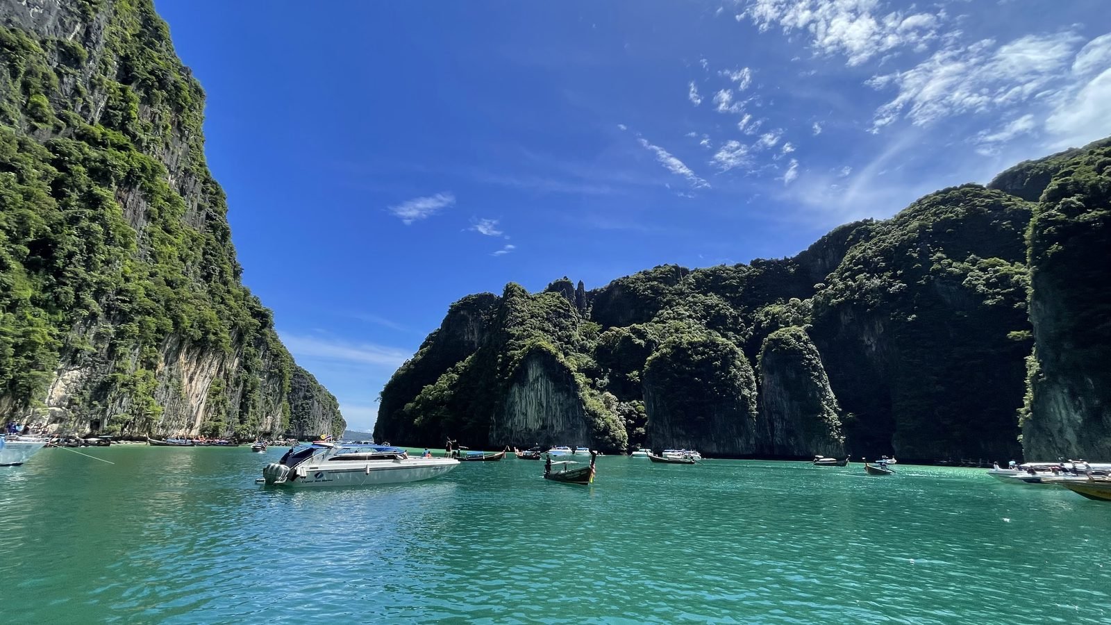 Limestone cliffs rising from turquoise waters